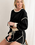 Black Contrast Trim Loose Pullover and Lace-up Waist Skort Set - Toi ‘n’ Moi Ltd