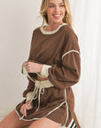 Black Contrast Trim Loose Pullover and Lace-up Waist Skort Set - Toi ‘n’ Moi Ltd