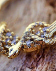 Gold Plated Jeweled Wings and Snake Seamless Ring / Septum Ring