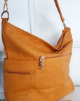 Faux Leather Shoulder Bag with Side Pocket Zip Detail